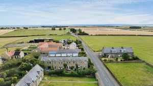Photo taken showing the west elevation and the sea behind in the east- click for photo gallery